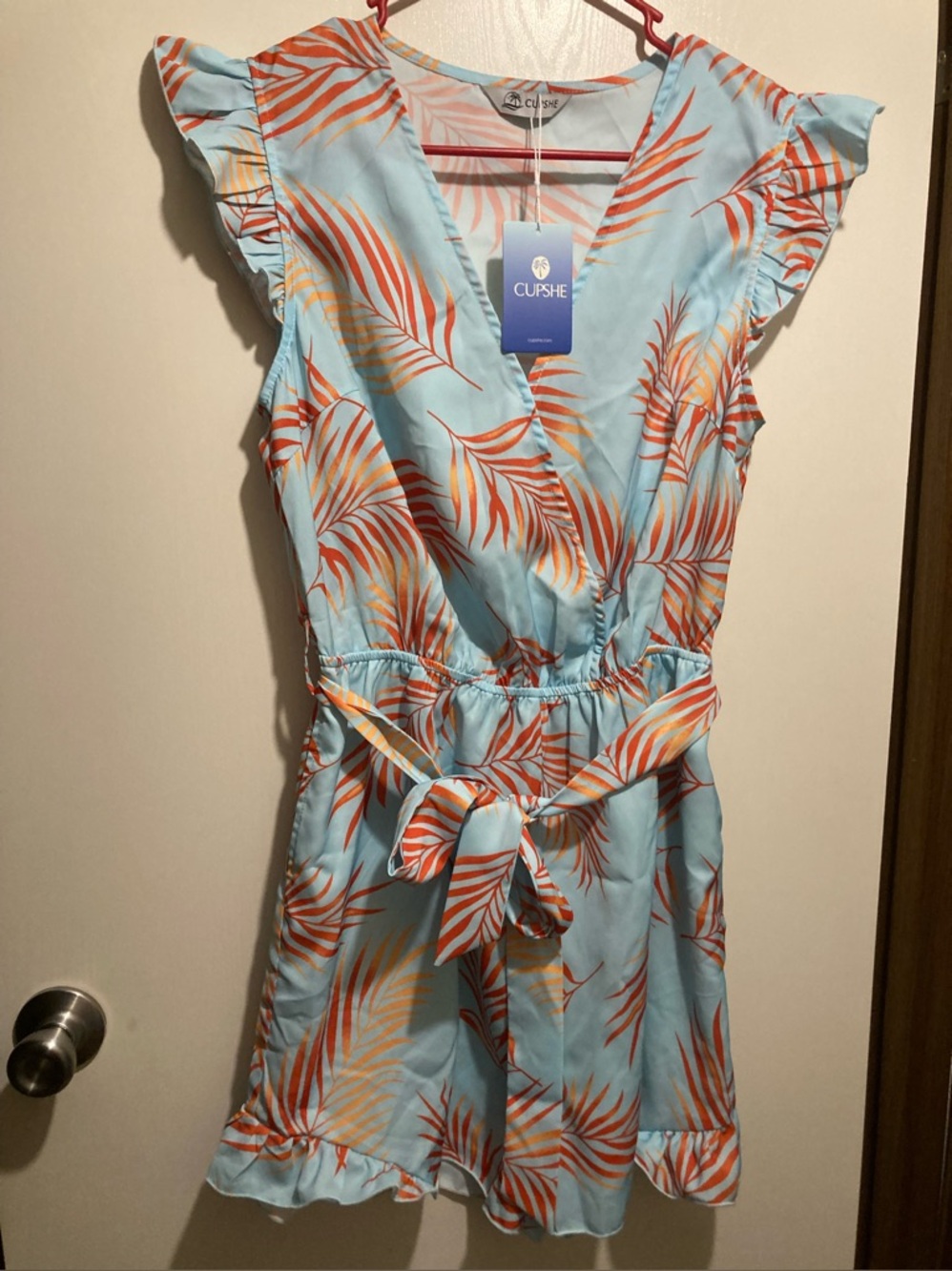 CUPSHE Light Blue Tropical Palm Wrap Romper with Orange Leaves